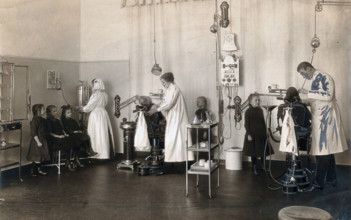 A school-children's dental clinic in Berlin: some children being treated..., c1900. Creator: Unknown.
