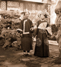 China: a Manchu bride in her wedding clothes with her maid, Beijing, 1869. Creator: John Thomson.