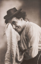 George Robey in drag as a pantomime dame, (between 1900 and 1909?). Creator: Unknown.
