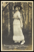 A prisoner of war acting in an internment camp in Dülmen, performing in drag, wear..., [1910-1919?]. Creator: Unknown.