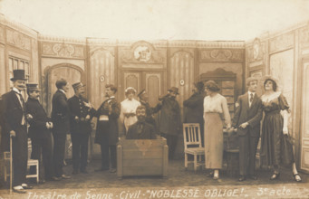 Prisoners of war, some in drag, posing on stage during a crowded scene of "Noblesse...(1910-1919?). Creator: Unknown.