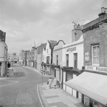A street view looking from Battersea High Street towards Battersea Church Road, 1962-1964. Creator: John Gay.