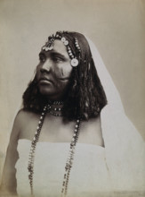 A North African woman with scarification on her cheeks, c1900. Creator: Gabriel Lekegian.