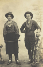 British prisoners of war in cowboy and cowgirl costumes posing at...(1910 - 1919?). Creator: Paul Tharan.