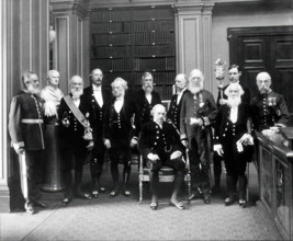 Fellows of the Royal Society: Sir John Evans, bust of Sir Isaac Newton, Lord Kelvin, RB Clifton... Creator: Mayall.