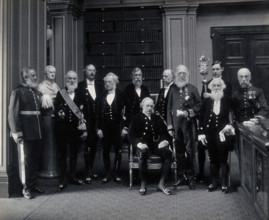 Fellows of the Royal Society: Sir John Evans, bust of Sir Isaac Newton, Lord Kelvin, RB Clifton... Creator: Mayall.