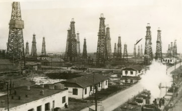 The Kaganovich oilfield outside Baku, 1940. Creators: Air Ministry, Royal Air Force.