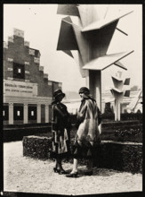 Models wearing dresses by Sonia Delaunay in front of the Arbre Cubiste (Cubist Tree) by the..., 1925 Creator: Mallet-Stevens, Robert (1886-1945).