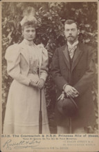 Princess Alix of Hesse and the Tsarevich Nicholas at Coburg on the day of their betrothal, 1894. Creator: Photo studio J. Russell & Sons, London  .