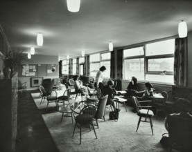 Abbey Wood County High School, Woolwich, London: teachers relaxing in the staff room, 1962. Creator: Unknown.