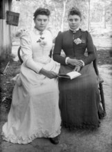 Two unknown ladies, possibly sisters, 1905. Creator: Robert Augustus Henry L'Estrange.