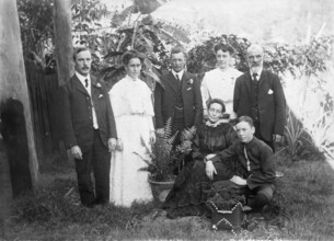 Portrait photograph of William Manderville Ellis L'Éstrange (left) and other family members, 1910. Creator: Robert Augustus Henry L'Estrange.