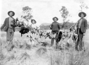 Unknown men and boy with a successful duck shoot, c1900s. Creator: Robert Augustus Henry L'Estrange.