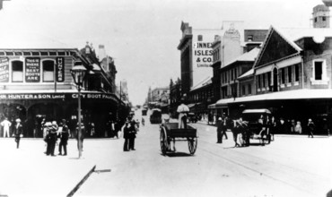 Policeman directs traffic at the intersection of Queen and Edward St, Brisbane, Queensland, c1908. Creator: Unknown.