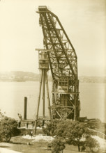 Erection of H.M.A.S. Sydney's mast, Bradleys Head, 1934. Creator: Unknown.