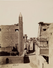 Entrance to Temple of Luxor with Modern Mud-Brick Houses. Luxor, East Bank, between 1860 and 1903. Creator: Antonio Beato.
