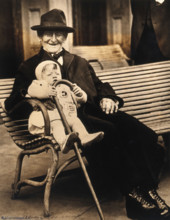 John Daubeny, a centenarian, holding a 1 year old boy, c1922. Creator: Unknown.