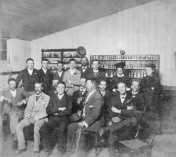 Group posed photo in classroom with Dr Wilton W.R. Love with Chemistry/Pharmacy students, 1894. Creator: Unknown.