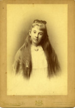 Portrait photography of an unknown teenage girl with beautiful long hair. Creator: Unknown.