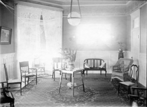 Unknown interior of Victorian family home with fine furniture, brass bed, c1900s.. Creator: Robert Augustus Henry L'Estrange.