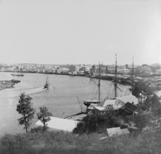 Brisbane River, Petrie Bight  with Customs House to the right, 1890. Creator: Robert Augustus Henry L'Estrange.