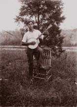 Untitled (man with banjo, neg, #1), c1931, printed c1975. Creator: Wendell Hotter.