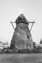 Exterior view of the derelict tower mill on Mill Green, Warboys, Cambridgeshire, 1936. Creator: HES Simmons.