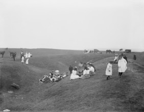 Bank Holiday picnic on the earthwork remains on White Horse Hill, Uffington, Oxfordshire, 1860-1922. Creator: Henry Taunt.