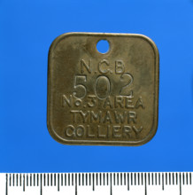 Tymawr Colliery, lamp check (brass), after 1947. Creator: Unknown.