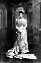 The Duchess of York at the Queen's Drawing-Room, 1895. Creator: Walery.