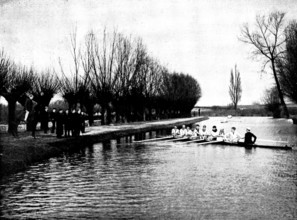 The Universities' Boat-Race: the Cambridge crew at practice - a word of advice from the coach, 1895. Creator: Stearn.