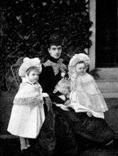 The Princess of Wales and her grandchildren, Lady Alexandra and Lady Maud Duff..., 1895. Creator: W&D Downey.