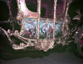 Detail of the Gold State Coach at the time of the coronation of Queen Elizabeth II, 1953. Creator: Arthur Charles Kirby Ware.