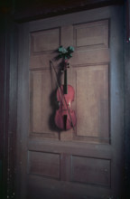 Violin on a door painted by Jan van der Vaart, Chatsworth House, Derbyshire, c1955. Creator: Arthur Charles Kirby Ware.