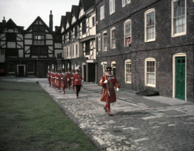 Yeomen Warders, Easter Sunday Parade led by the chief warder, Tower of London, 1954.   Creator: Arthur Charles Kirby Ware.