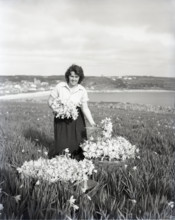 Picking flowers, St Mary's, Scilly Isles, c1955. Creator: Arthur Charles Kirby Ware.