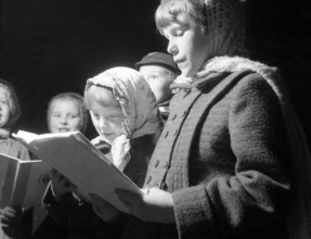Carol singers, c1955. Creator: Arthur Charles Kirby Ware.
