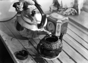 Making tea, c1955. Creator: Arthur Charles Kirby Ware.