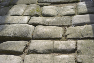 Remains of a Roman road next to the Valmardon Gate, paved with granite slabs, Toledo, Spain, 2022. Creator: LTL.