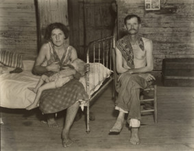 Bud Fields with His Wife Ivy, and His Daughter Ellen, Hale County, Alabama, 1936. Creator: Walker Evans.