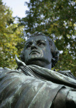 Bronze statue of Martin Luther next to the Marienkirche, (St Mary's Church), Berlin, Germany, 2025. Creator: LTL.