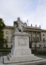 Marble statue of Wilhelm von Humboldt at the entrance to Humboldt University, Berlin, Germany, 2025. Creator: LTL.