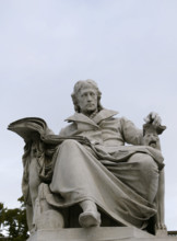 Marble statue of Wilhelm von Humboldt at the entrance to Humboldt University, Berlin, Germany, 2025. Creator: LTL.
