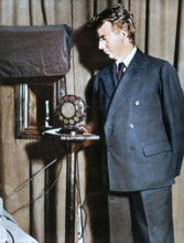 John Logie Baird watching the first play to be televised, 14 July 1930, (1935). Creator: Unknown.
