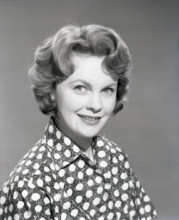 Woman in patterned blouse, c1955. Creator: Arthur Charles Kirby Ware.