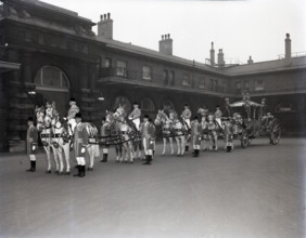 The Gold State Coach, Royal Mews, London, 1953.  Creator: Arthur Charles Kirby Ware.
