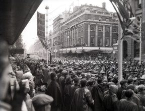 Crowds watching the coronation procession of Queen Elizabeth II, Oxford Street, London, 2 June 1953. Creator: Arthur Charles Kirby Ware.