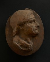 Cast of head of Roman soldier with creased brow. Creator: Unknown.