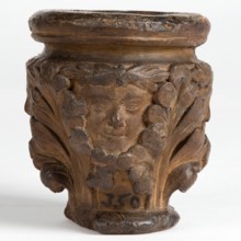 Cast of a medieval capital with leaf foliage and faces, possibly representing the Green Man, c1870. Creator: Unknown.