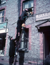 Tutti Men claiming a kiss, Hocktide Festival, Hungerford, Berkshire, c1955. Creator: Arthur Charles Kirby Ware.